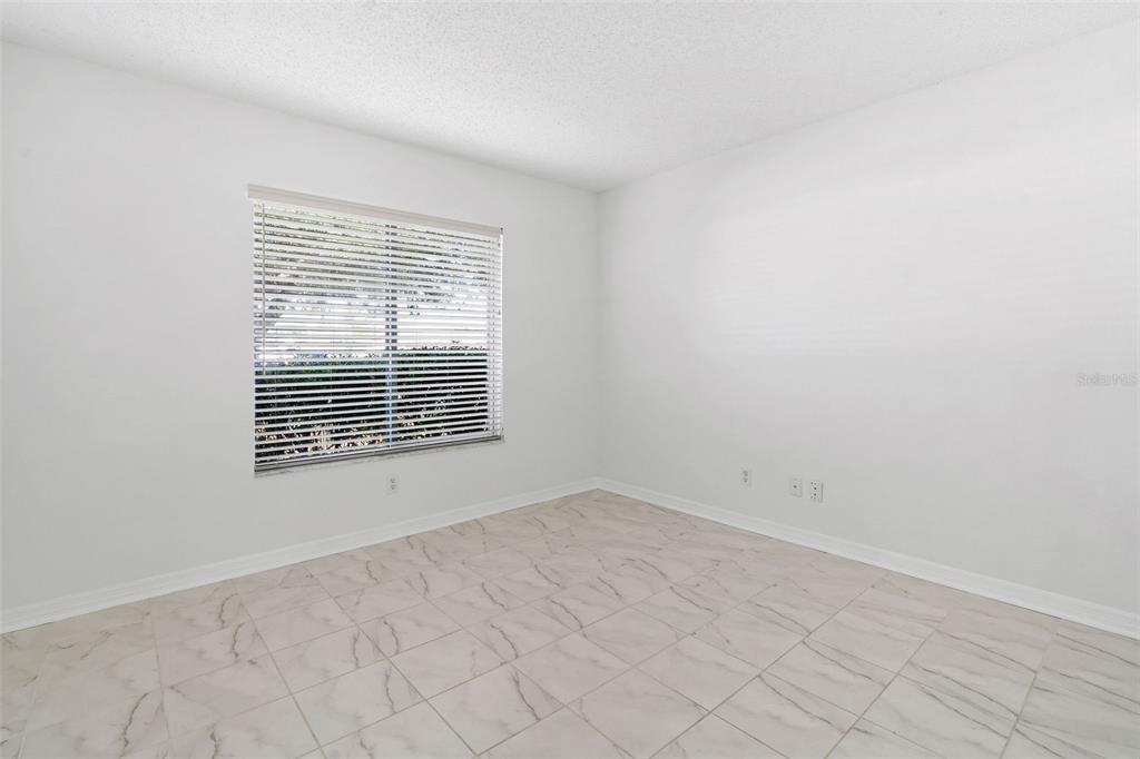 1504 Silktree Court Brandon, FL 33511 - Photo 21 of 26 a view of an empty room with a window
