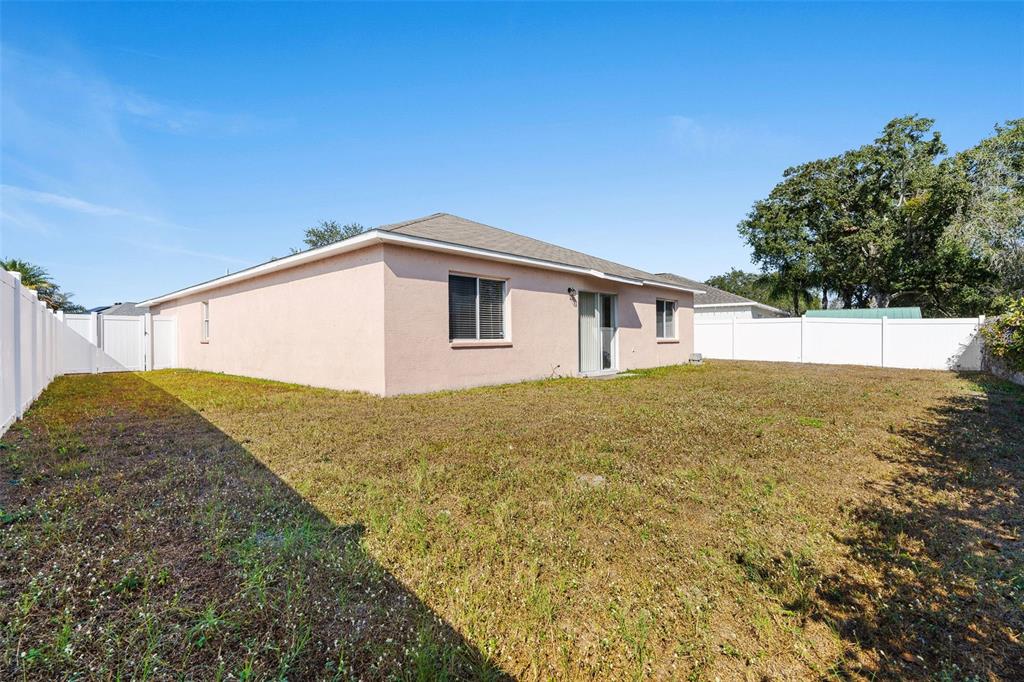 1504 Silktree Court Brandon, FL 33511 - Photo 23 of 26 a backyard of a house