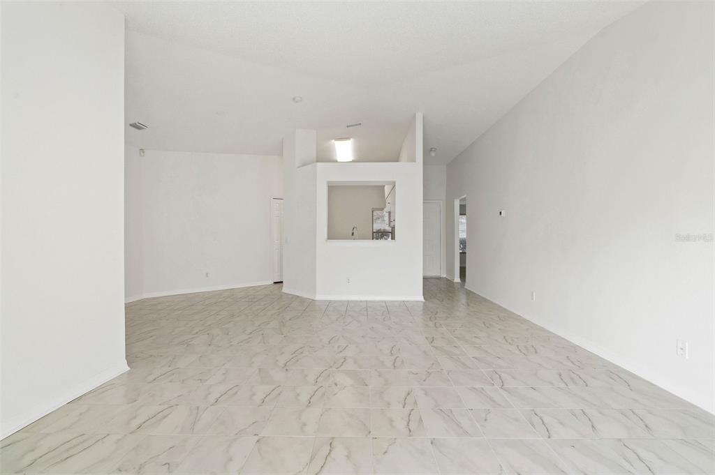 1504 Silktree Court Brandon, FL 33511 - Photo 6 of 26 a view of an empty room with a window