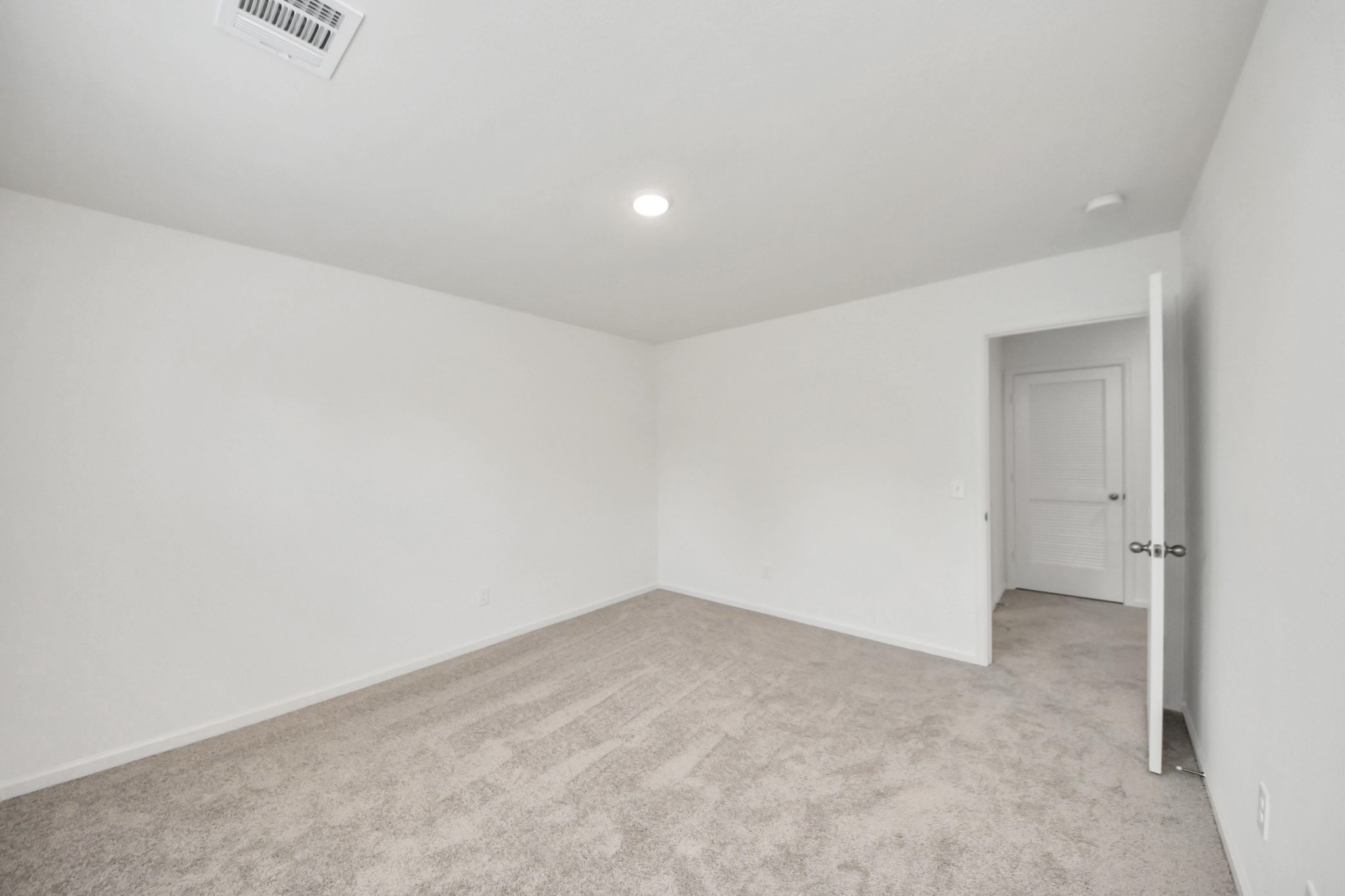 10303 Rose Mar Drive, Unit B Rosharon, TX 77583 - Photo 25 of 49 an empty room with an entryway