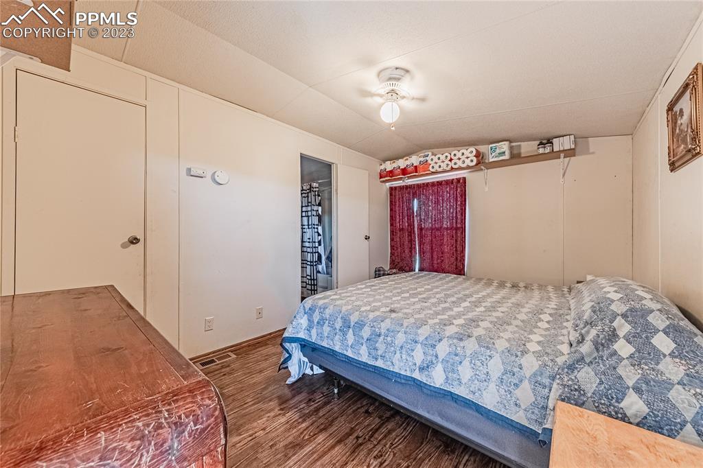 24225 East View Road Trinidad, CO 81082 - Photo 20 of 50 a bedroom with a bed and a dresser