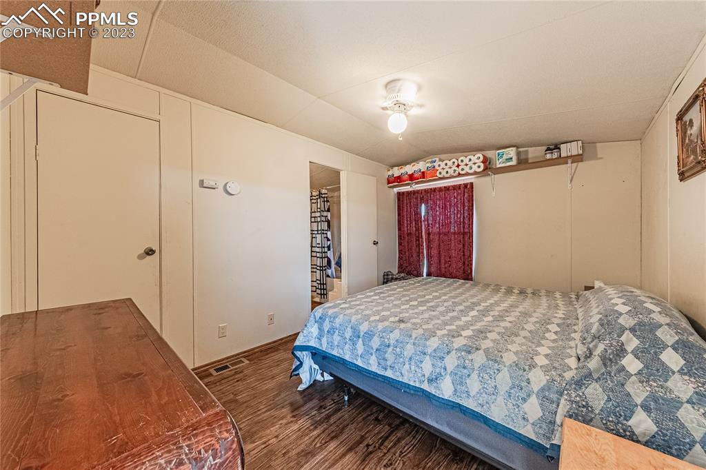 24225 East View Road Trinidad, CO 81082 - Photo 22 of 50 a bedroom with a bed and a mirror