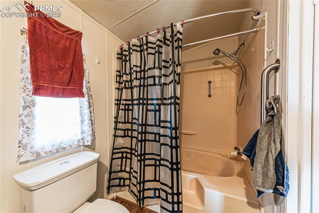 24225 East View Road Trinidad, CO 81082 - Photo 25 of 50 a bathroom with a shower toilet and sink