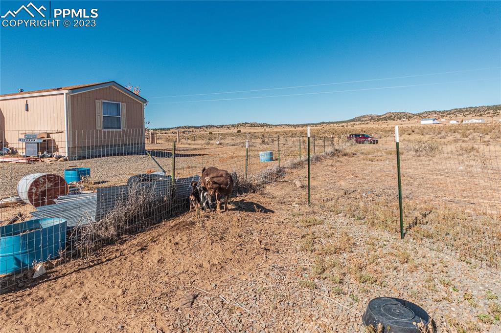 24225 East View Road Trinidad, CO 81082 - Photo 36 of 50 a view of a backyard with chairs