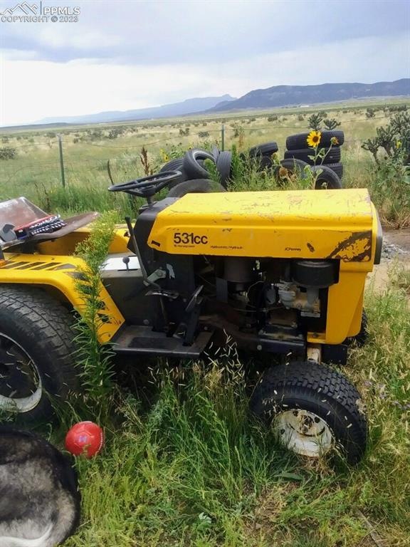 24225 East View Road Trinidad, CO 81082 - Photo 50 of 50 a view of a swimming pool with an outdoor seating and a yard