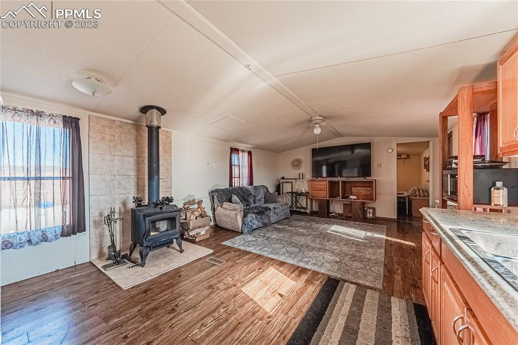 24225 East View Road Trinidad, CO 81082 - Photo 8 of 50 a living room with furniture large window and a fireplace