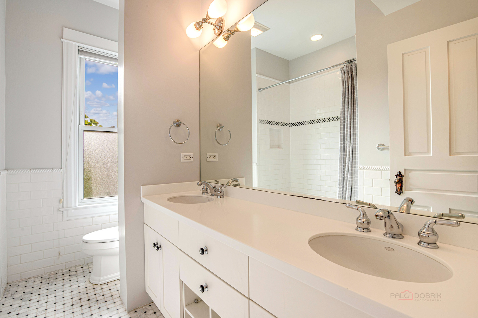 71 Washington Road Lake Forest, IL 60045 - Photo 24 of 39 a bathroom with a sink a toilet and shower