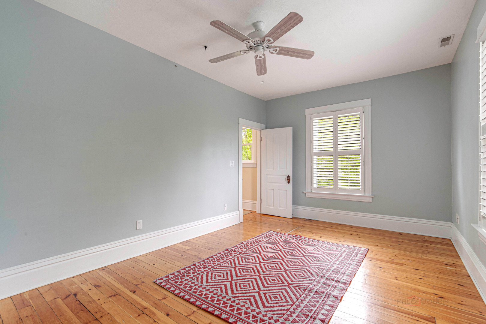 71 Washington Road Lake Forest, IL 60045 - Photo 28 of 39 a view of an empty room with a window and wooden floor