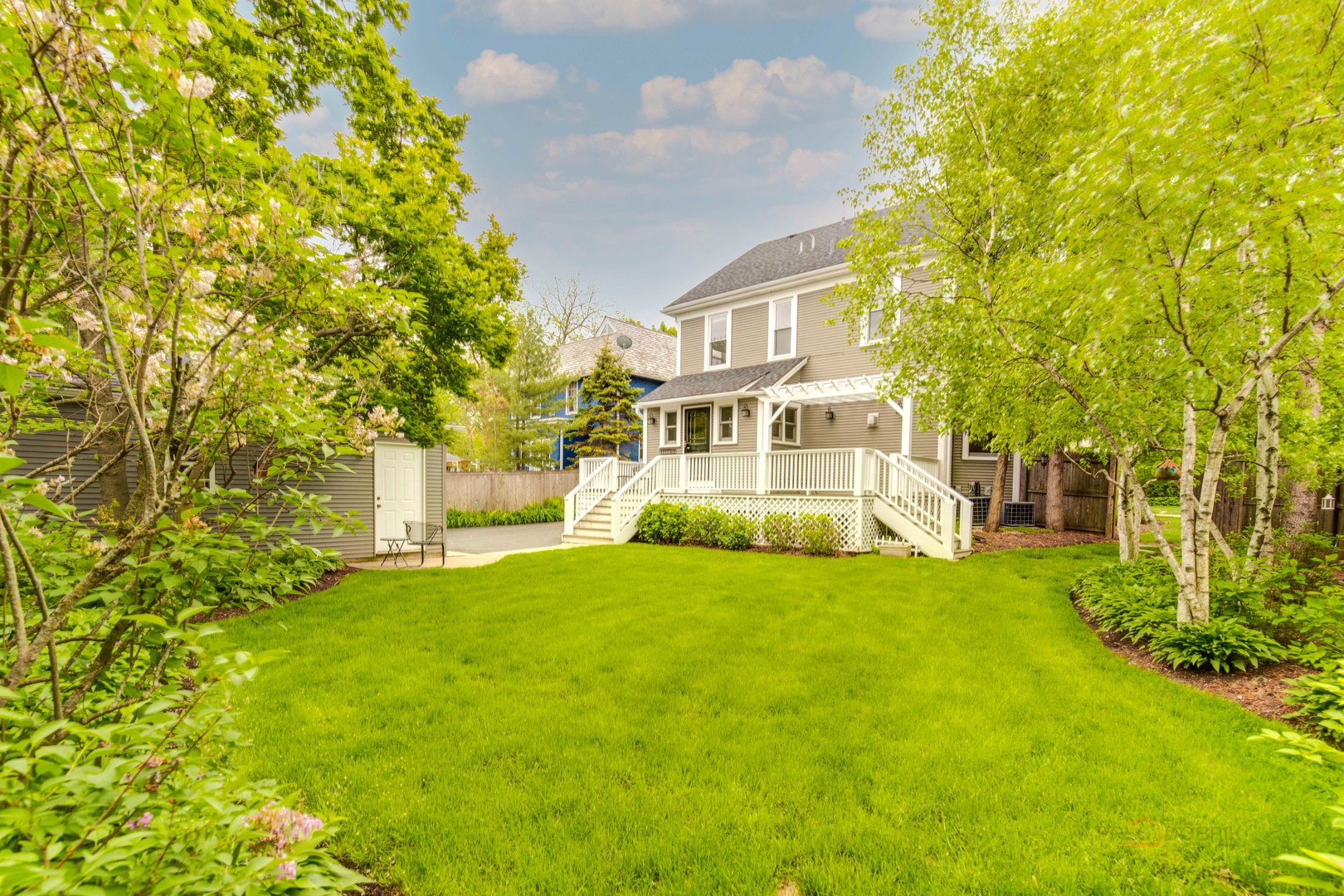 71 Washington Road Lake Forest, IL 60045 - Photo 36 of 39 a view of house with yard and trees in the background