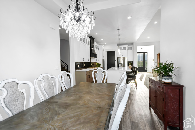 1952 Highway 118 Monroe, UT 84754 - Photo 51 of 88 Dining area with recessed lighting, wood finished floors, and a chandelier