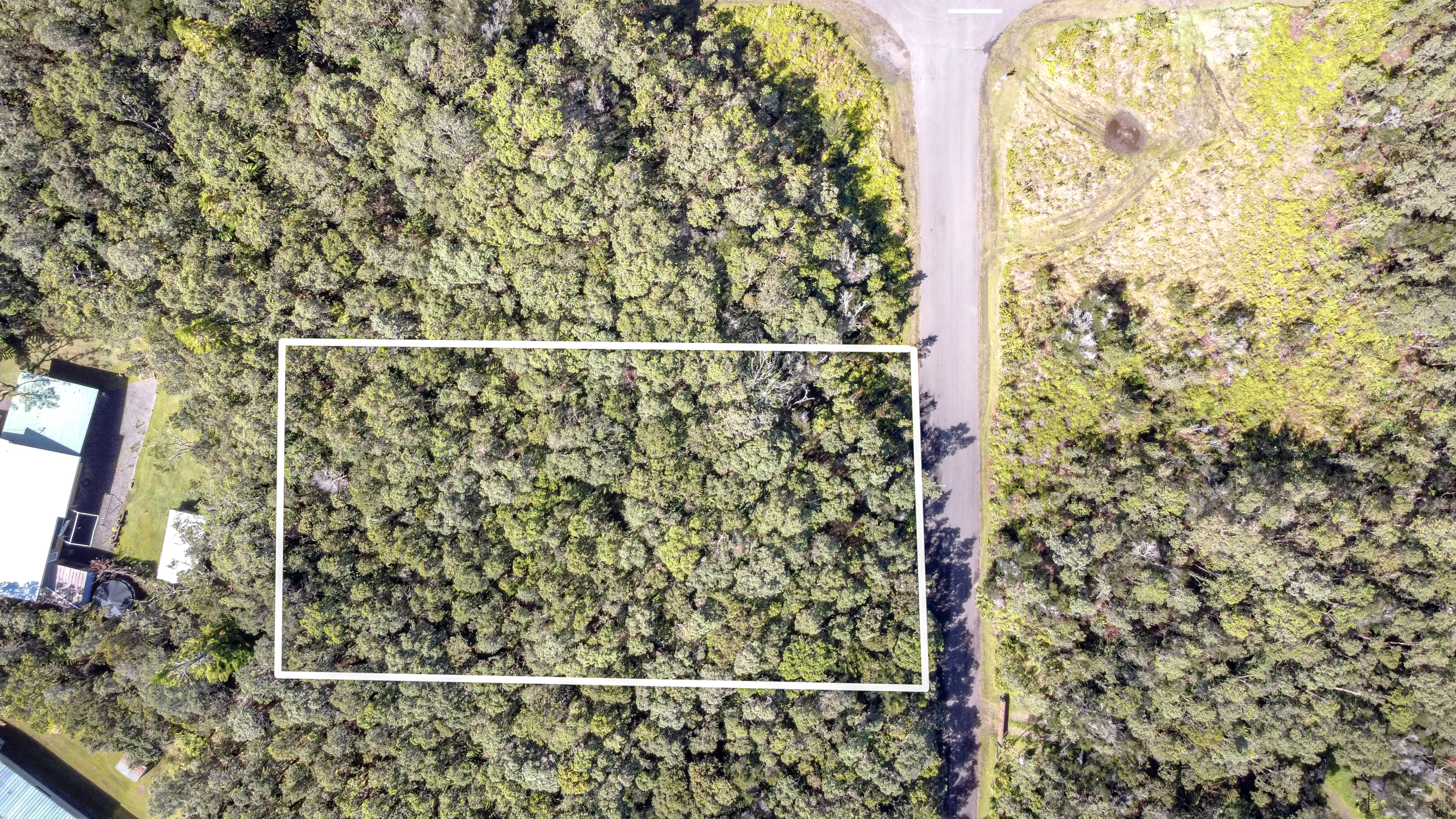 568 6th Street Volcano, HI 96785 - Photo 5 of 14 a bathroom with a shower curtain