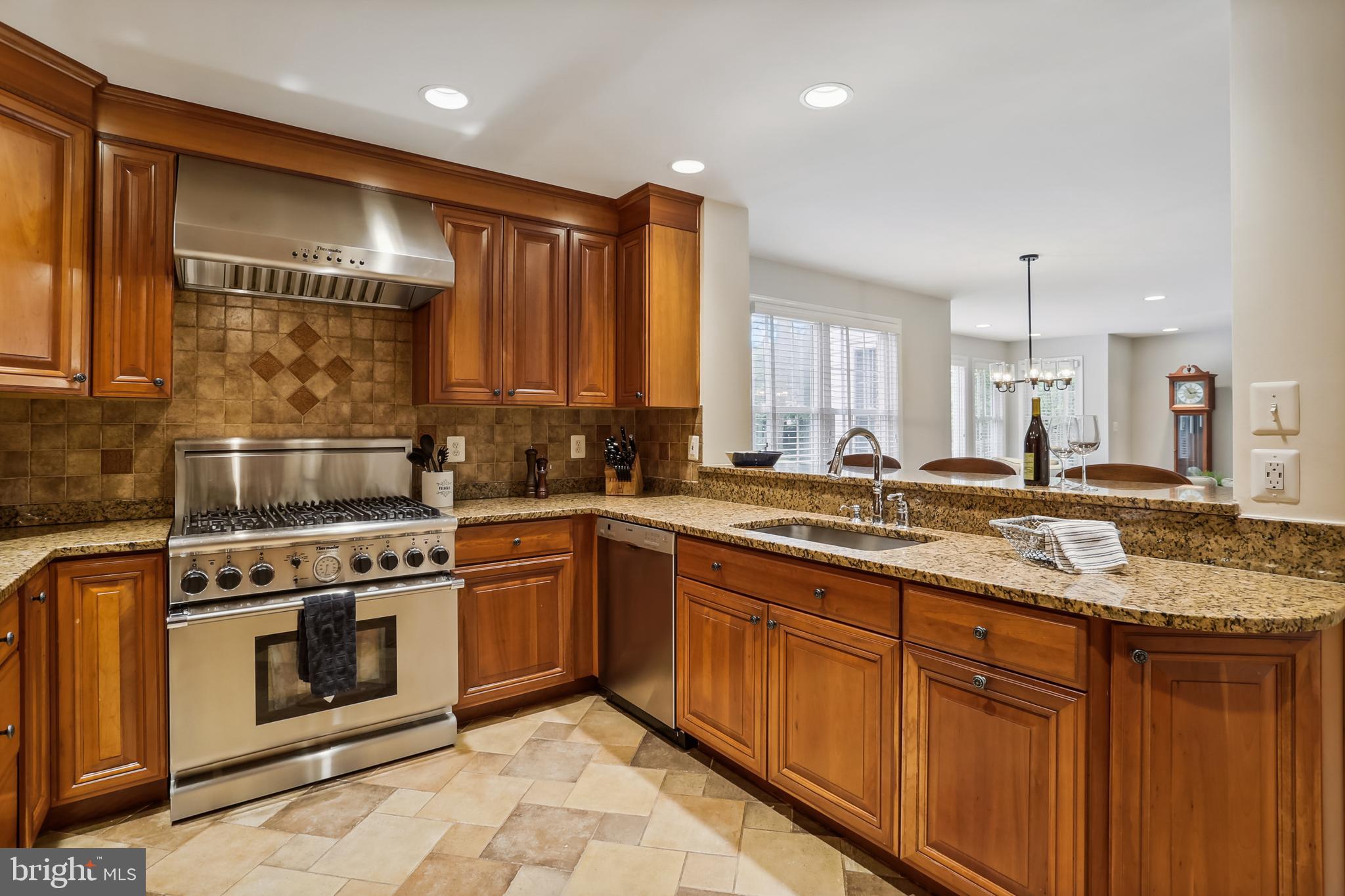 6820 Old Stage Road North Bethesda, MD 20852 - Photo 32 of 87 Rich cabinets and a Thermador stove!