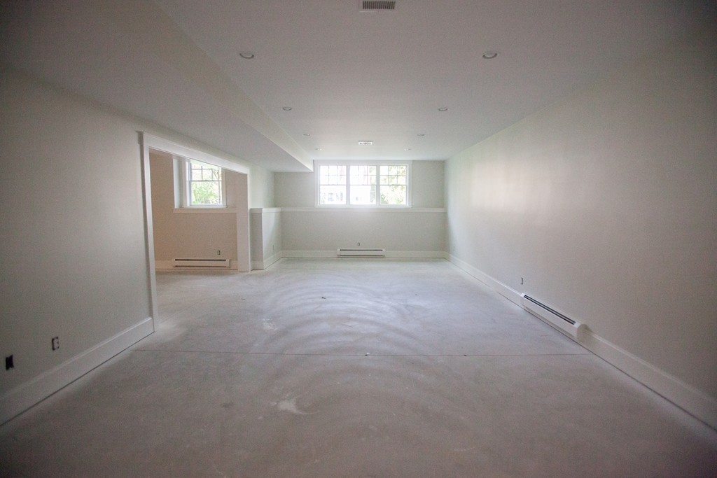 2 Cypress Road Wellesley, MA 02481 - Photo 20 of 22 a view of empty room with windows