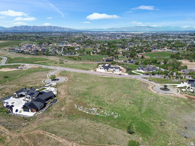 1284 Middle Canyon Court, Unit 69 Mapleton, UT 84664 - Photo 19 of 20 Aerial perspective of suburban area featuring a mountain backdrop