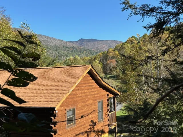 a view of a house with a mountain