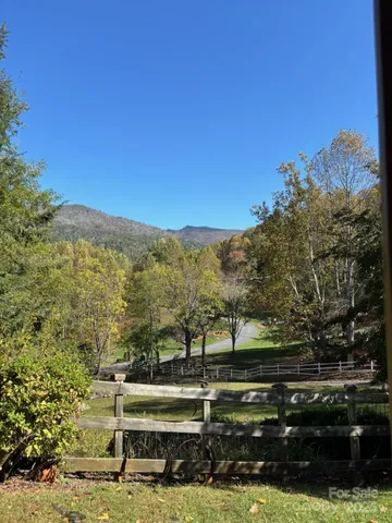 a view of residential houses with outdoor space