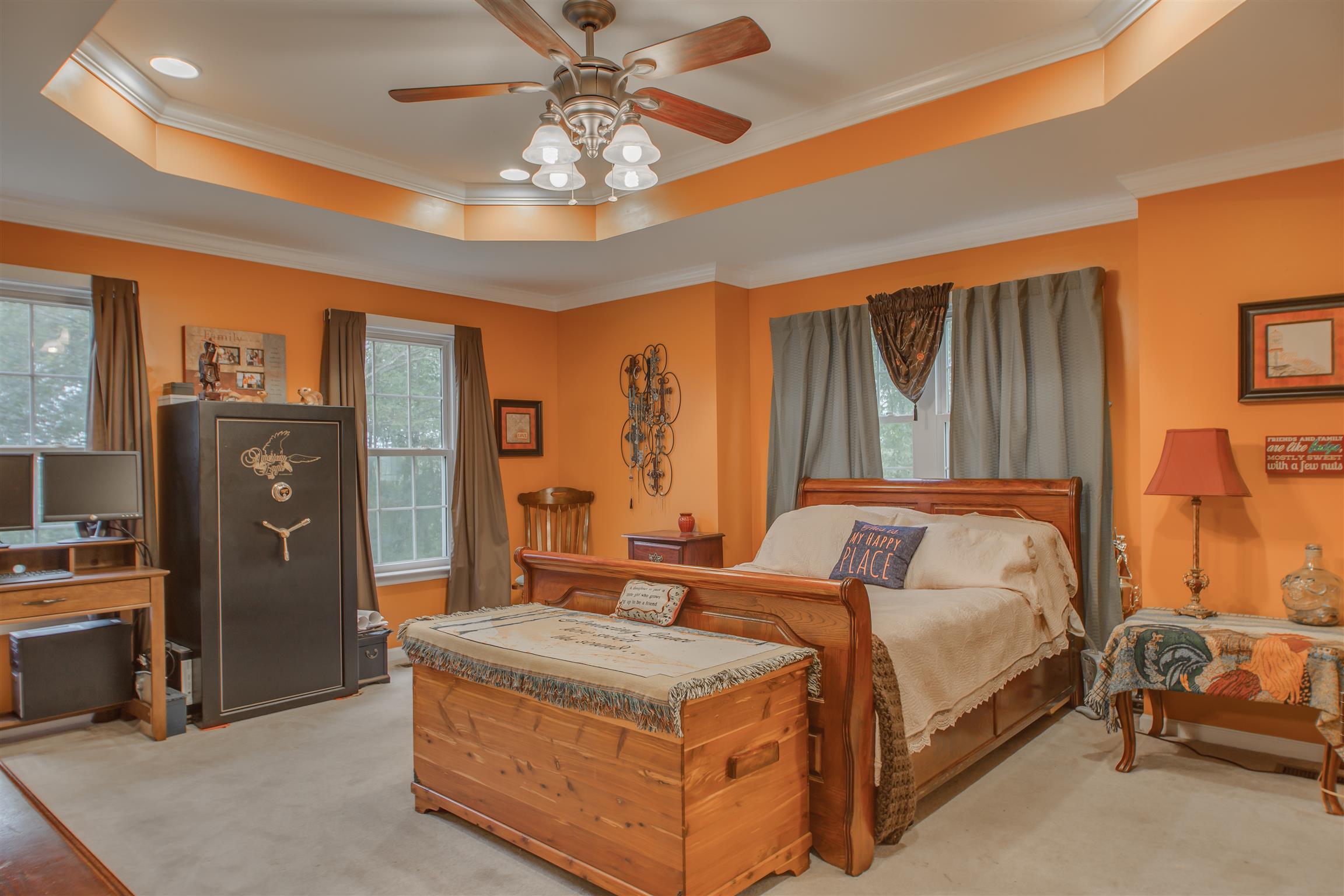 2943 Robert Skelley Road Columbia, TN 38401 - Photo 14 of 30 a bedroom with a large bed and a chandelier