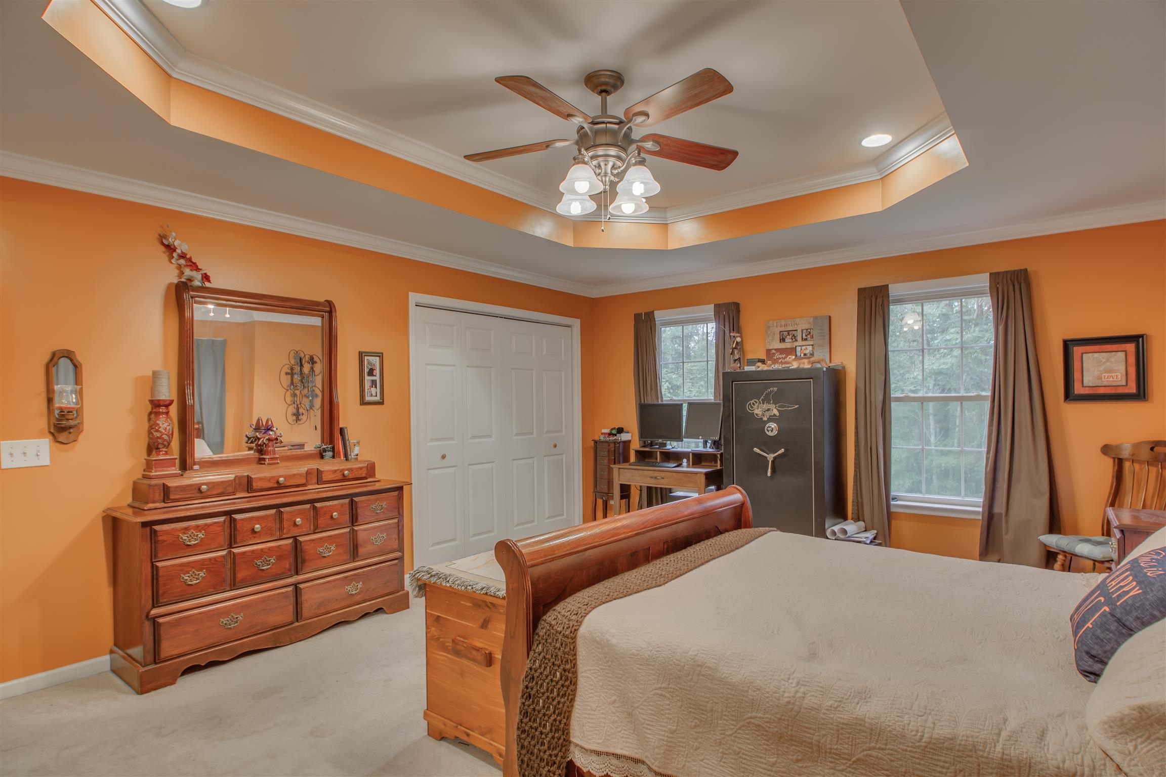 2943 Robert Skelley Road Columbia, TN 38401 - Photo 15 of 30 a bedroom with a bed and a chandelier