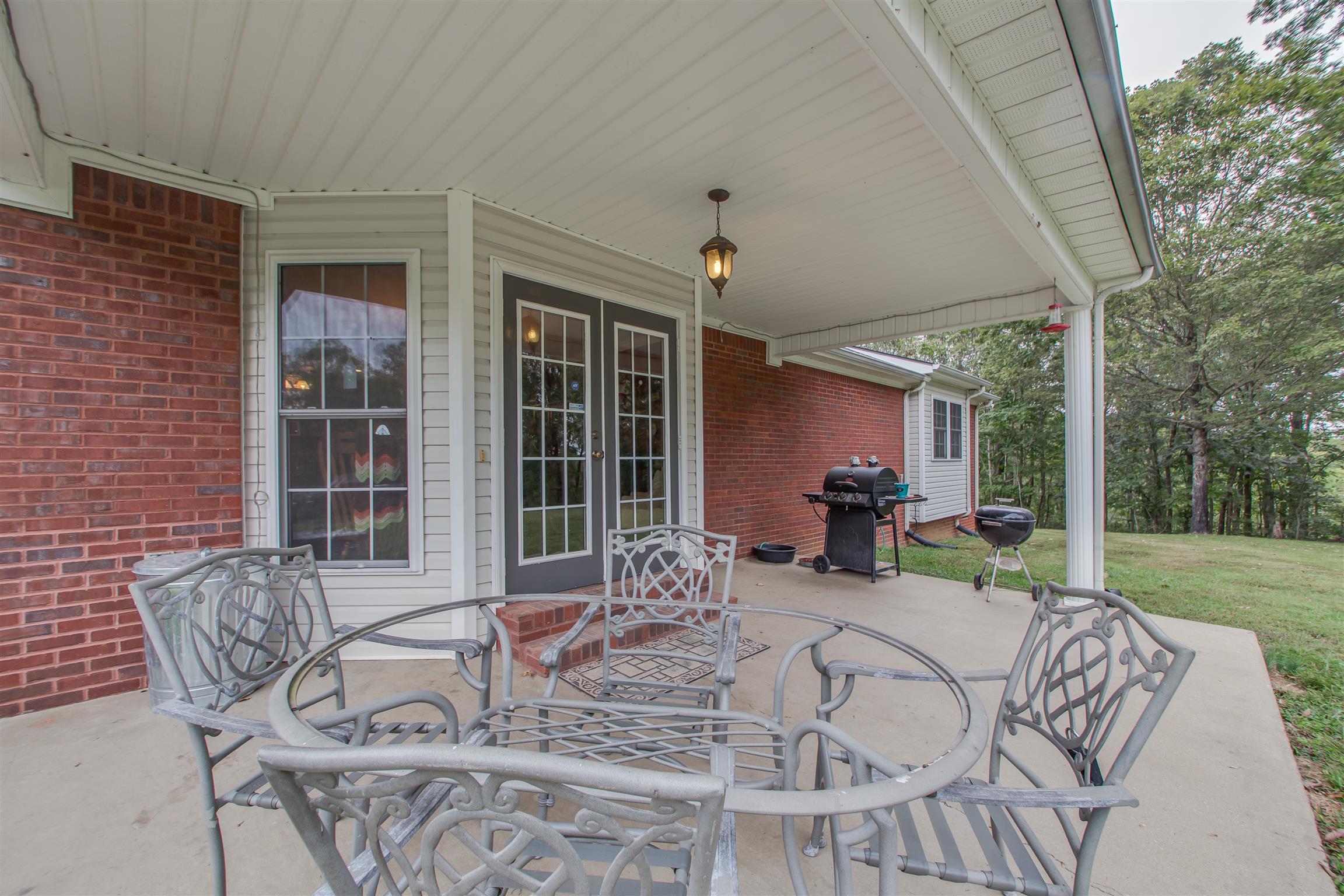 2943 Robert Skelley Road Columbia, TN 38401 - Photo 22 of 30 a view of a dining room with furniture window and outside view