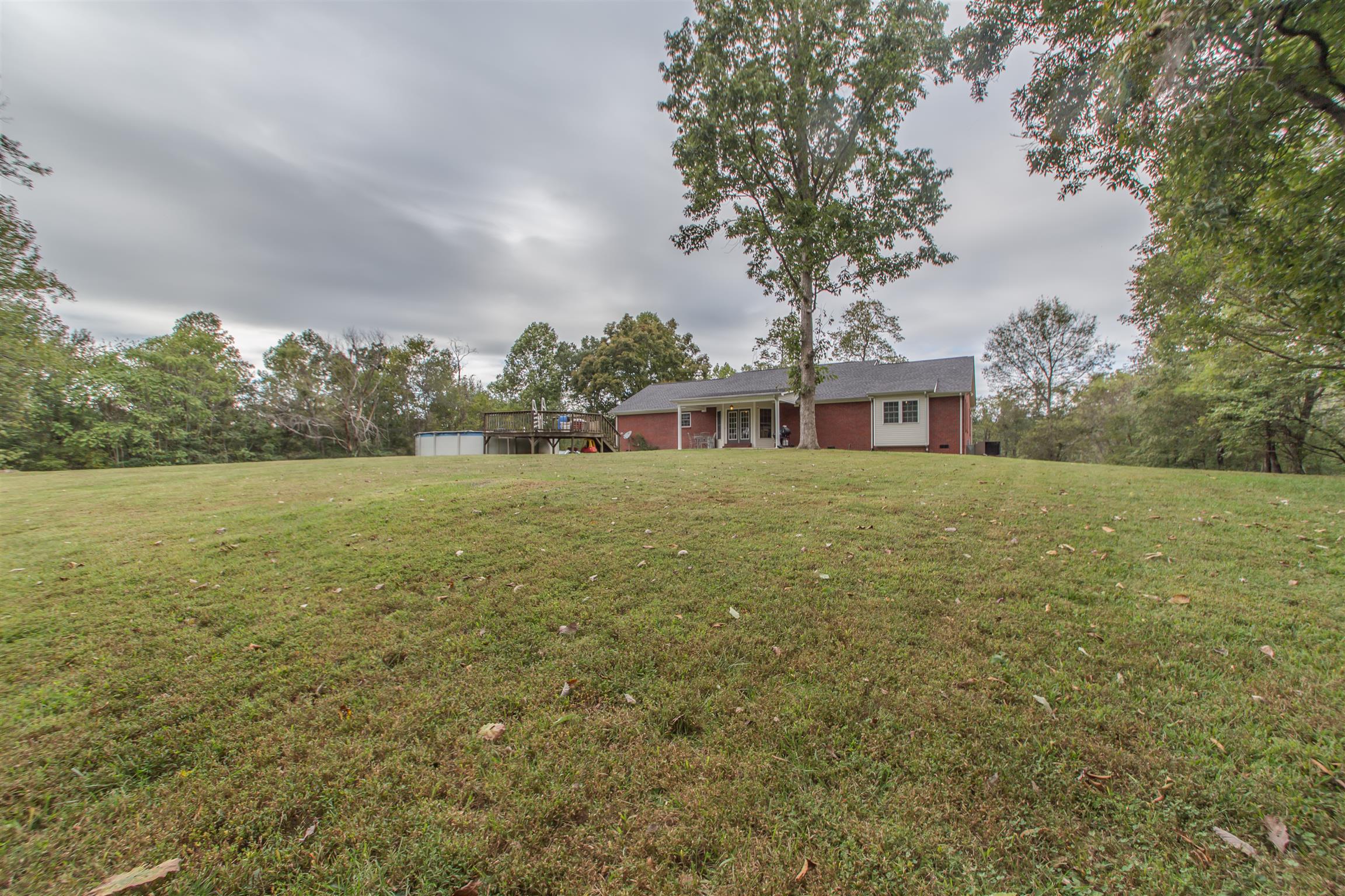 2943 Robert Skelley Road Columbia, TN 38401 - Photo 27 of 30 a view of a yard with a house in the background