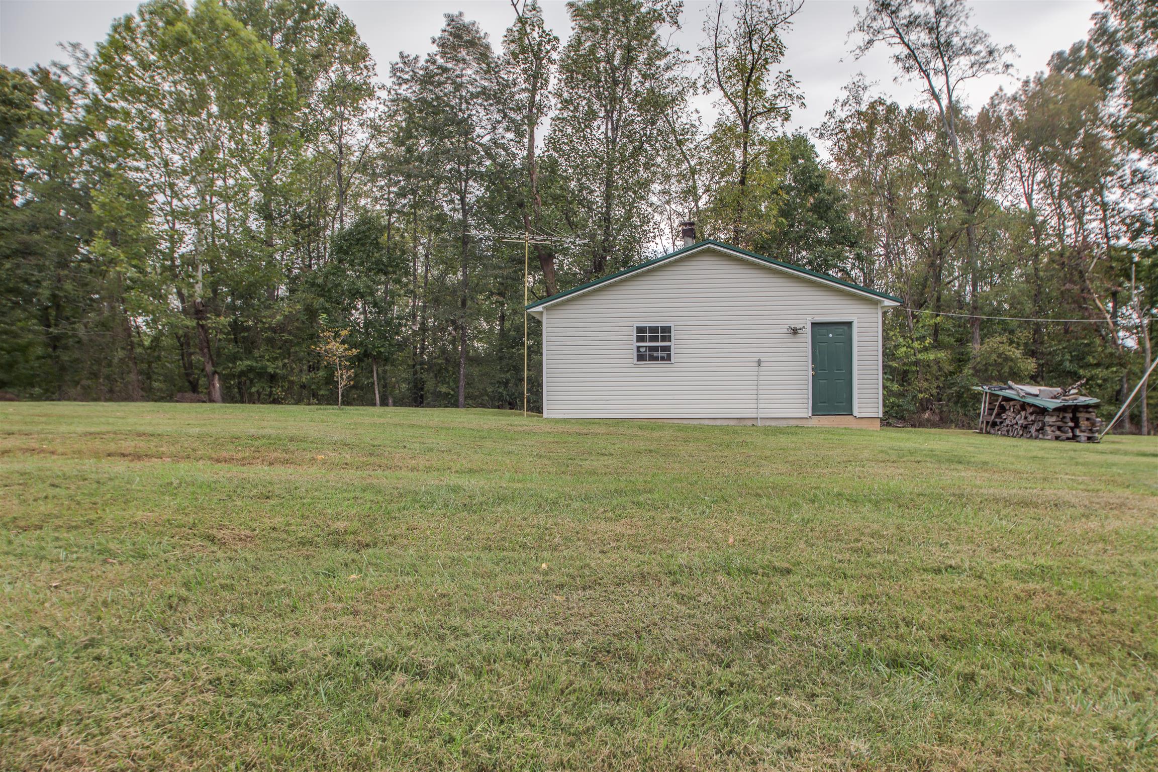 2943 Robert Skelley Road Columbia, TN 38401 - Photo 29 of 30 a house with a yard