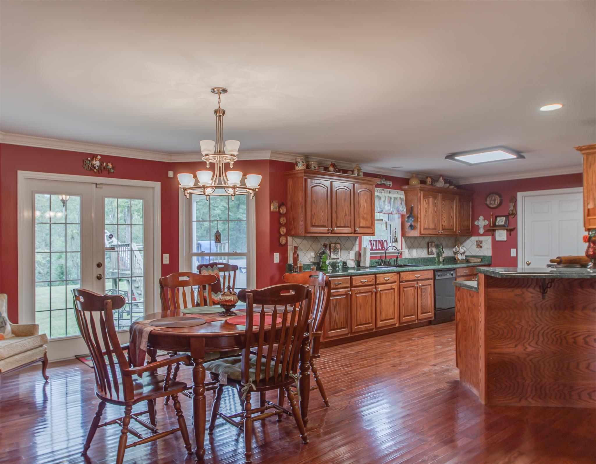 2943 Robert Skelley Road Columbia, TN 38401 - Photo 9 of 30 a dining room with furniture window and wooden floor