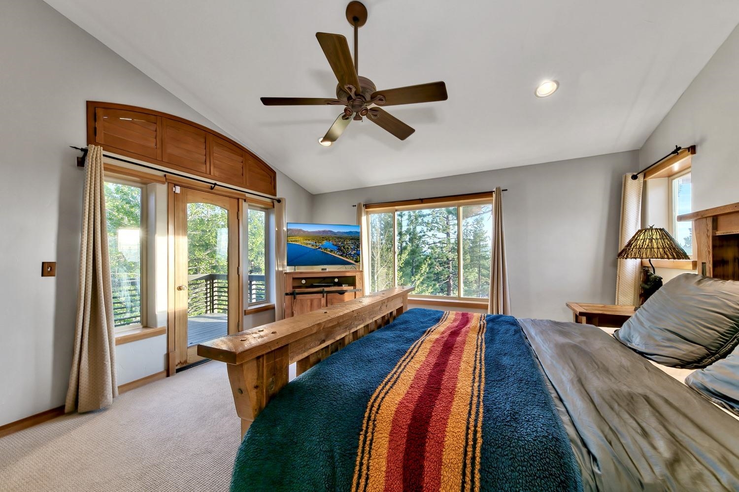 16125 Martis Peak Road Truckee, CA 96161 - Photo 14 of 21 a bed room with a bed and a large window