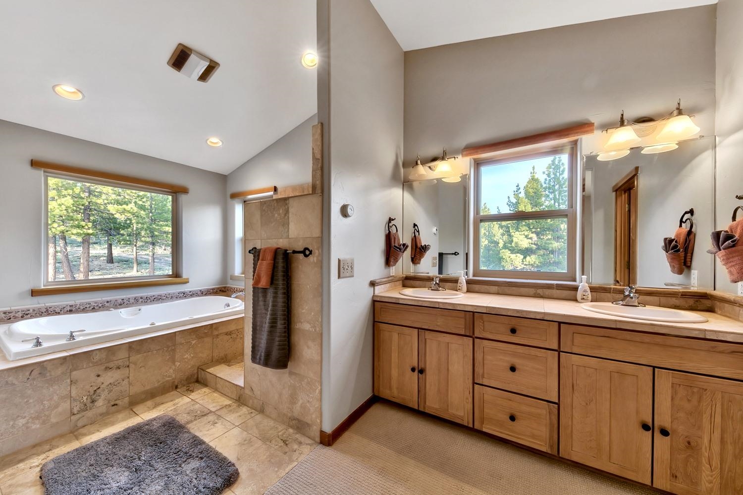 16125 Martis Peak Road Truckee, CA 96161 - Photo 15 of 21 a large bathroom with a large tub and sink