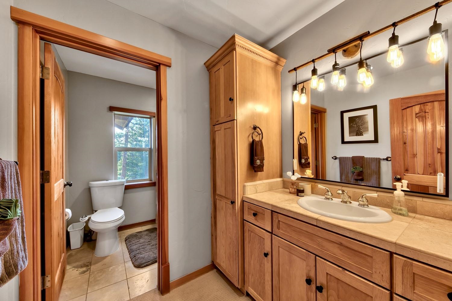 16125 Martis Peak Road Truckee, CA 96161 - Photo 17 of 21 a bathroom with a sink and a mirror