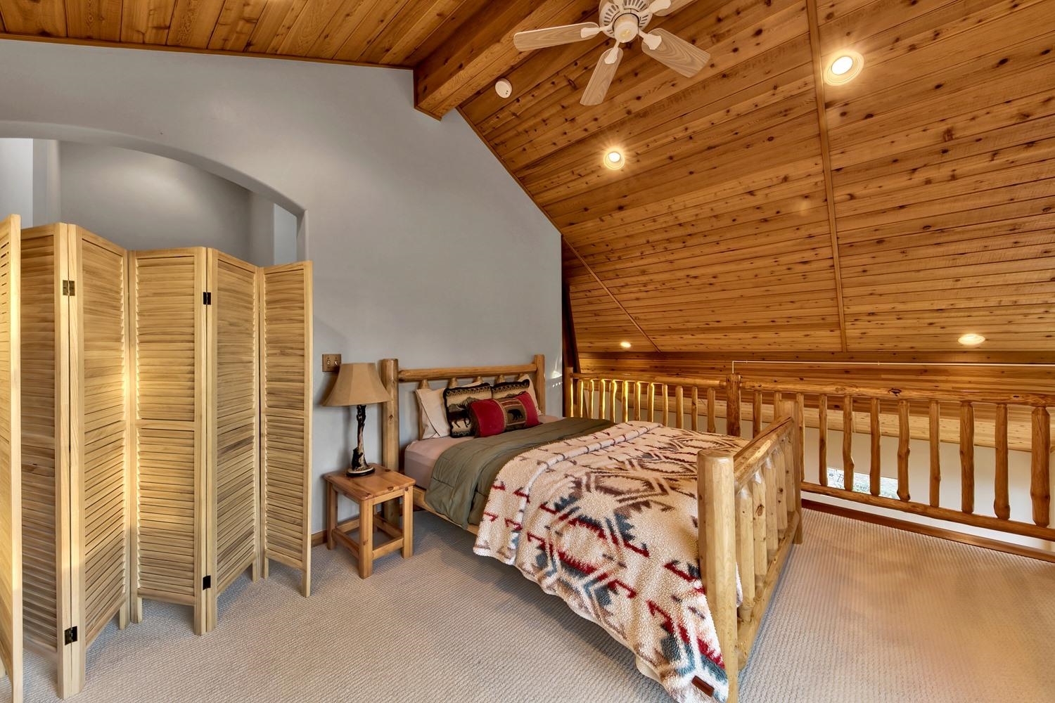 16125 Martis Peak Road Truckee, CA 96161 - Photo 19 of 21 a bedroom with a bed and a window