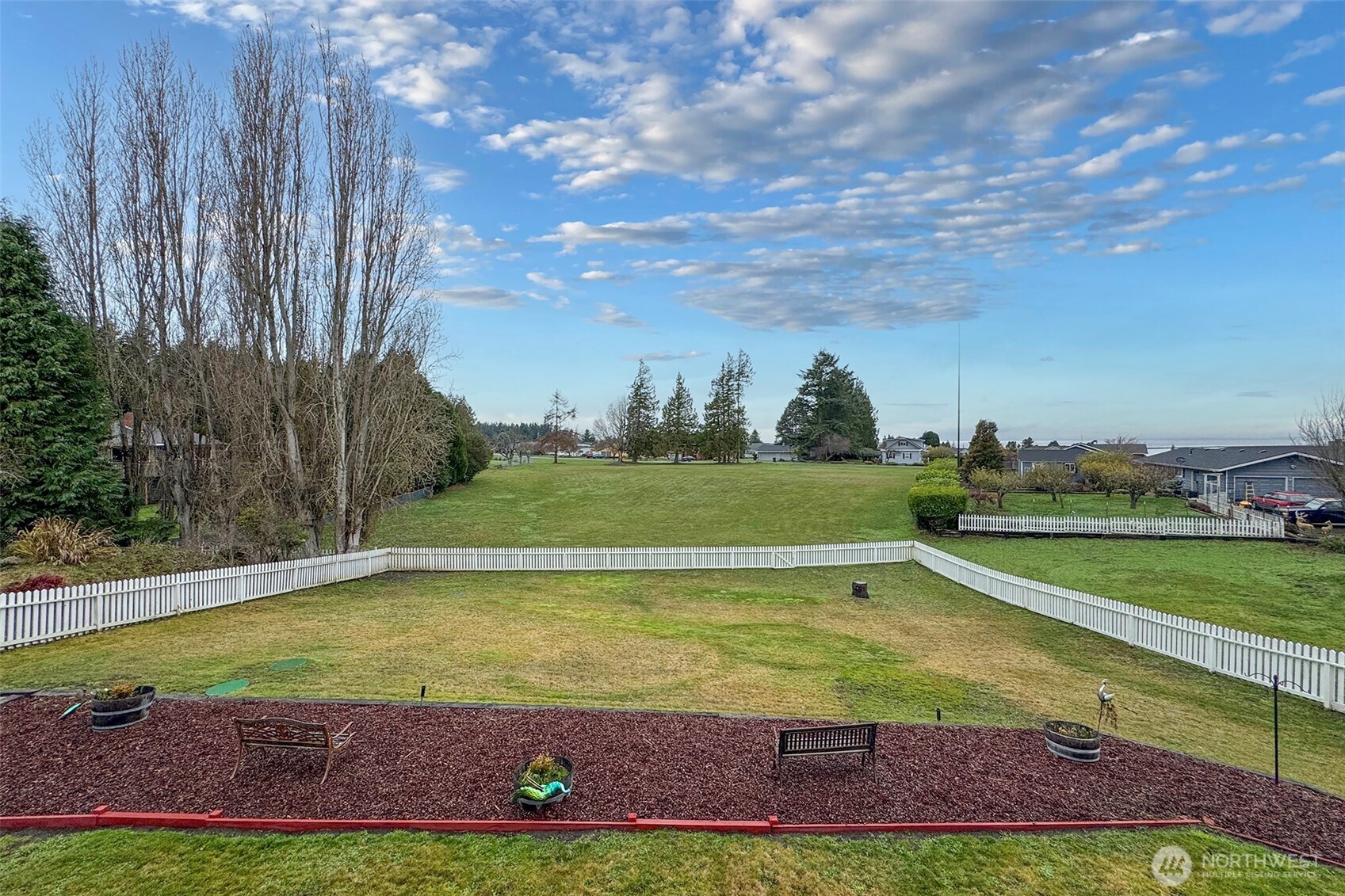 440 West Nelson Road Sequim, WA 98382 - Photo 13 of 39 a view of a swimming pool with an outdoor space and seating area