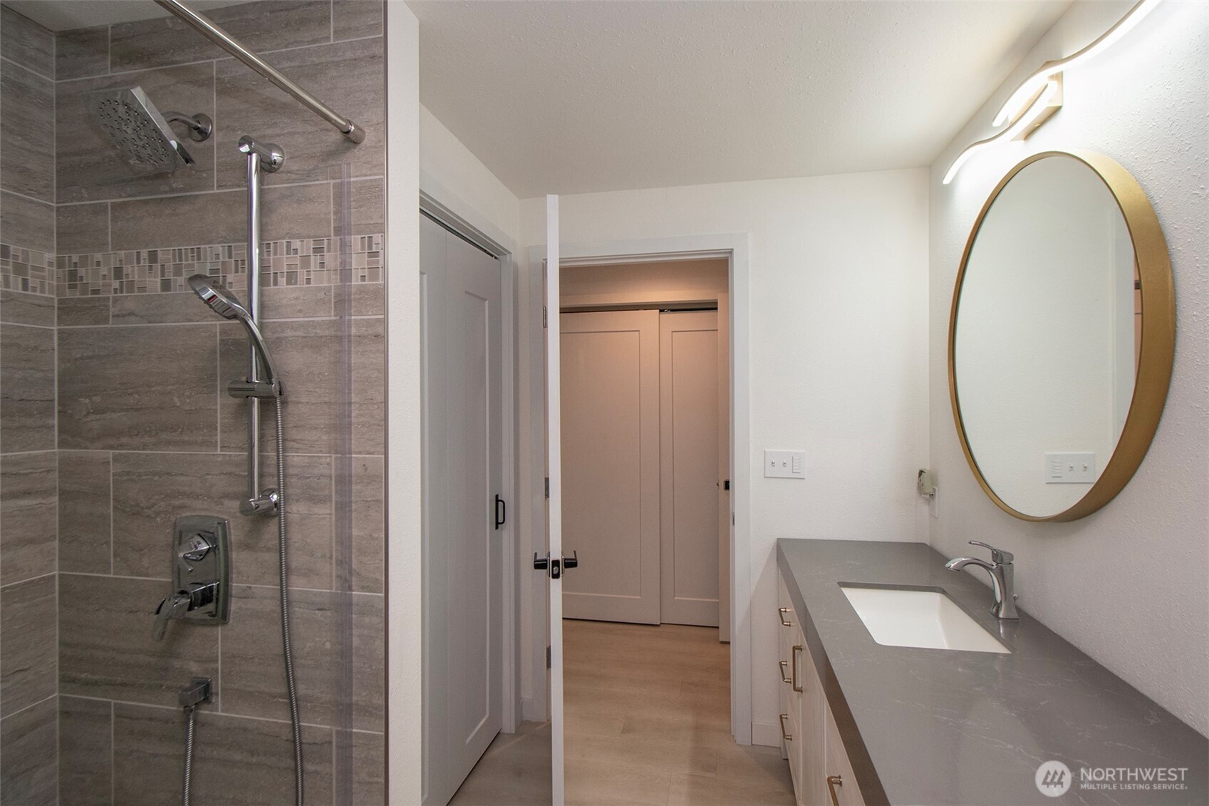 440 West Nelson Road Sequim, WA 98382 - Photo 24 of 39 a bathroom with a sink and a mirror