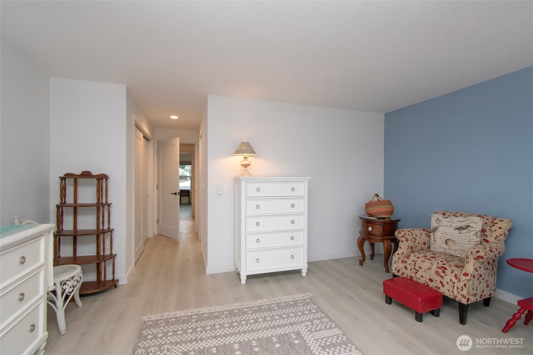 440 West Nelson Road Sequim, WA 98382 - Photo 26 of 39 a living room with furniture and a wooden floor