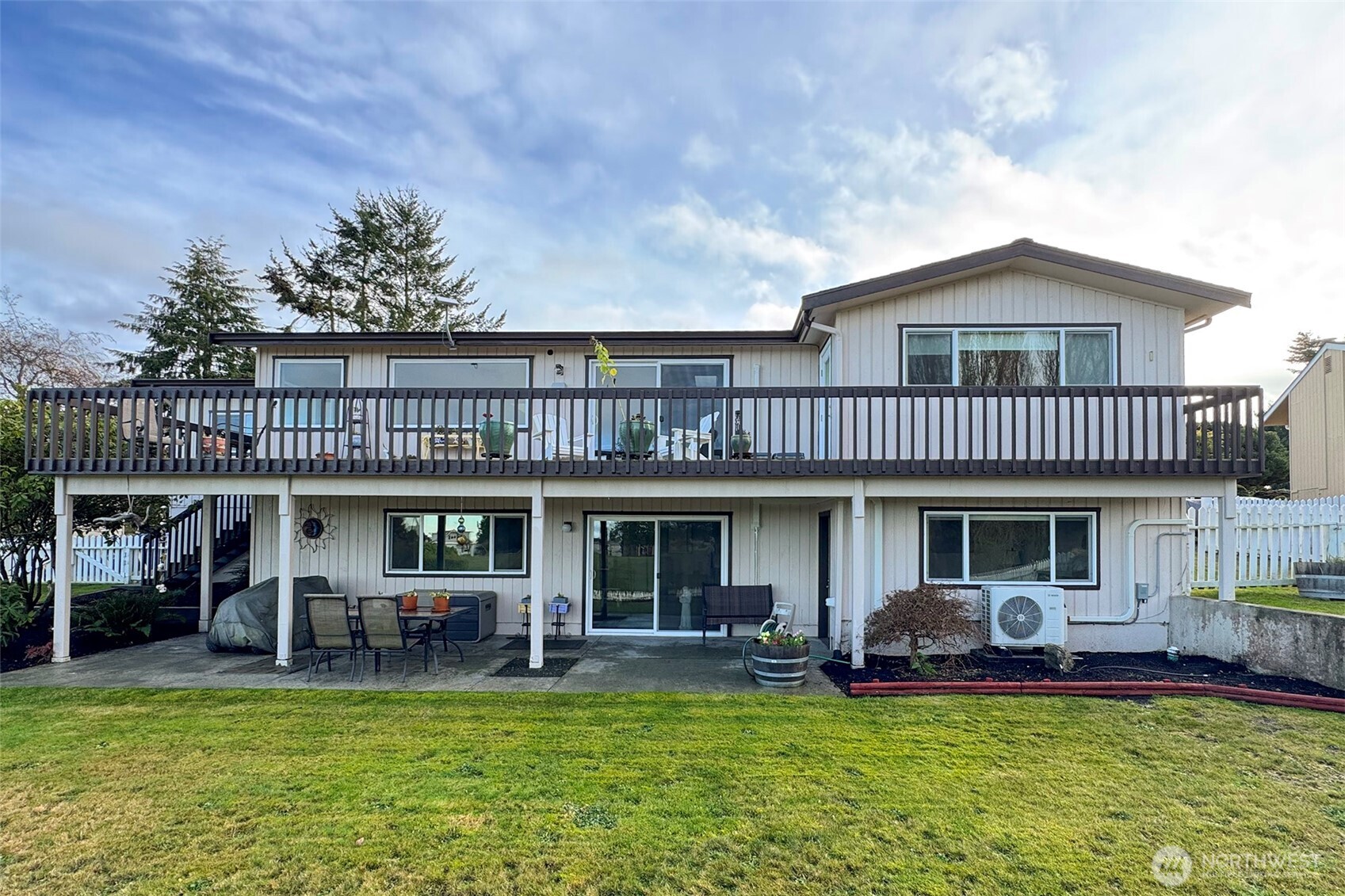 440 West Nelson Road Sequim, WA 98382 - Photo 39 of 39 a view of a house with a swimming pool and porch