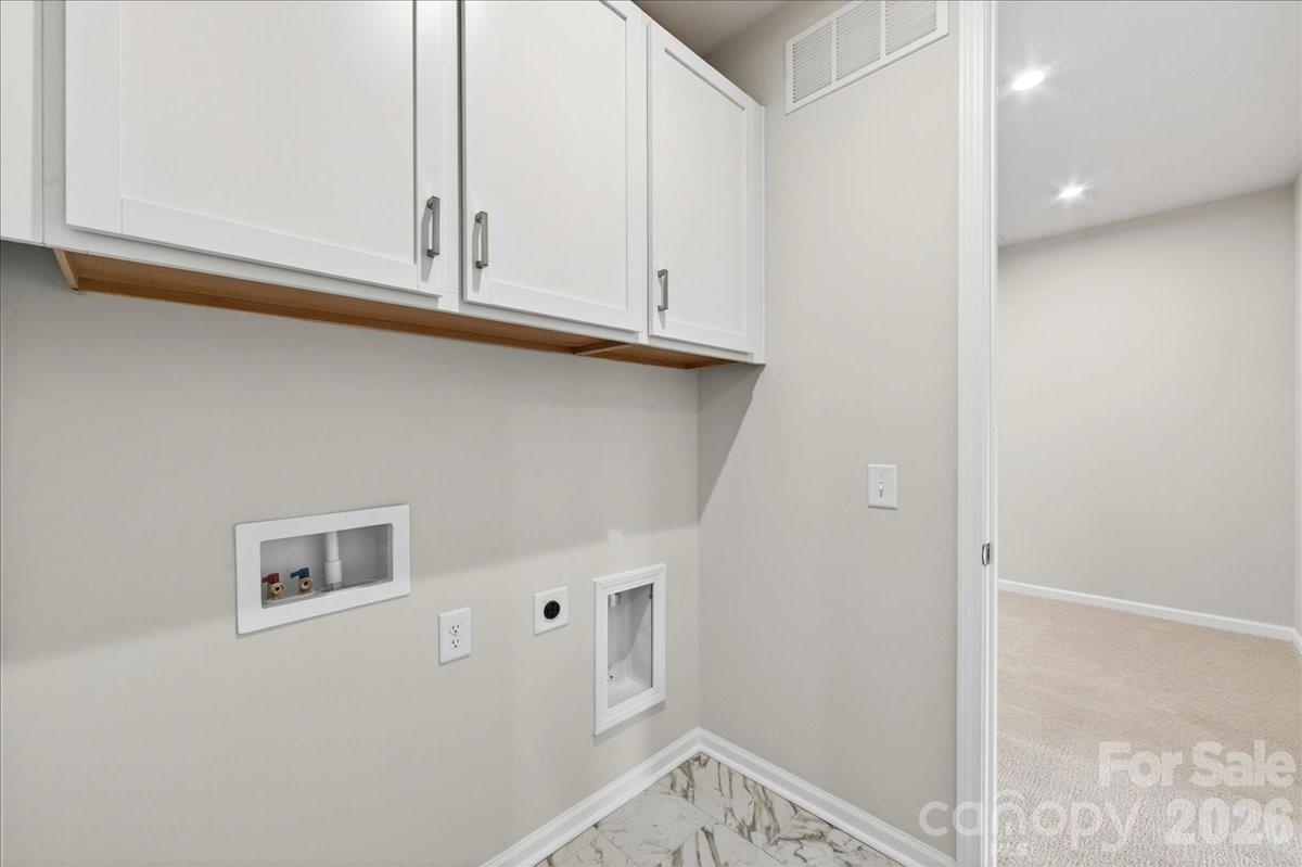 512 Webster Lane Cramerton, NC 28032 - Photo 26 of 28 a view of kitchen and utility room