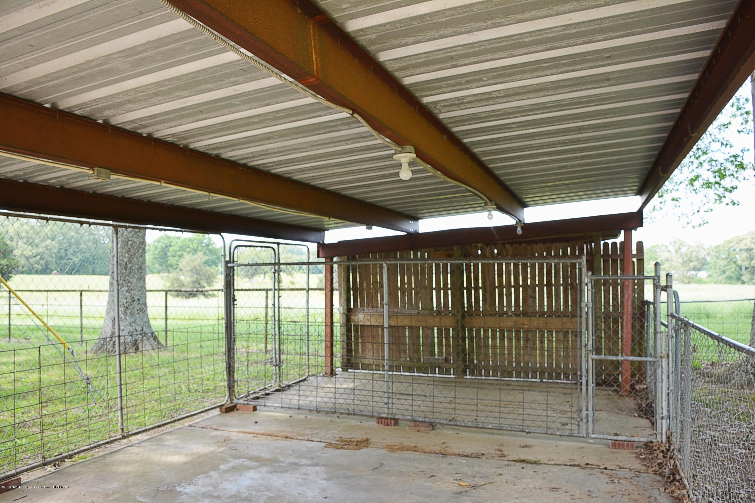 1466 A Merry Hill Ranch Road Senatobia, MS 38668 - Photo 18 of 27 Dog Kennel off Back yard