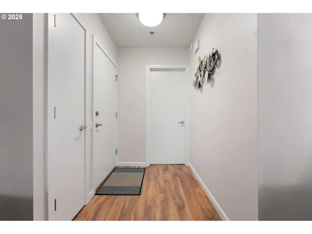 a view of a hallway with a white walls