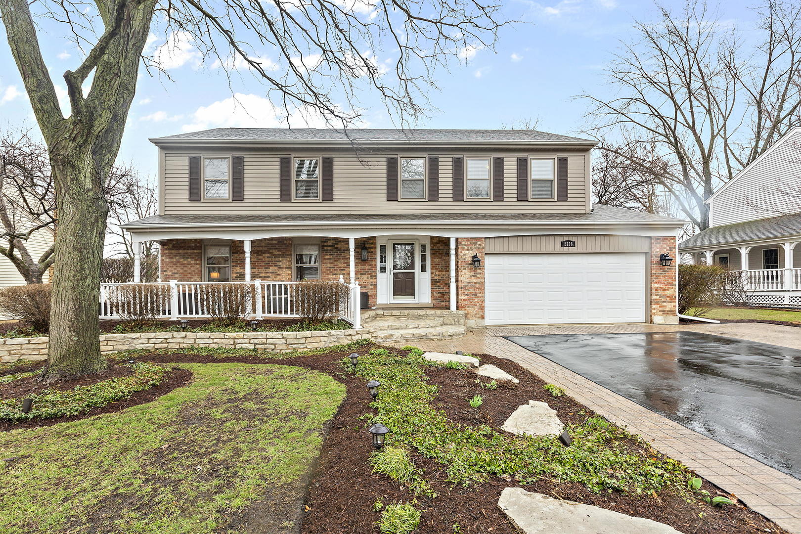 2706 Pebblebrook Lane Rolling Meadows, IL 60008 - Photo 1 of 34 front view of a house with a yard