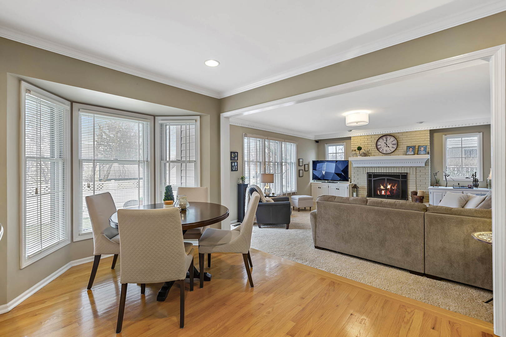 2706 Pebblebrook Lane Rolling Meadows, IL 60008 - Photo 12 of 34 a living room with furniture and a fireplace