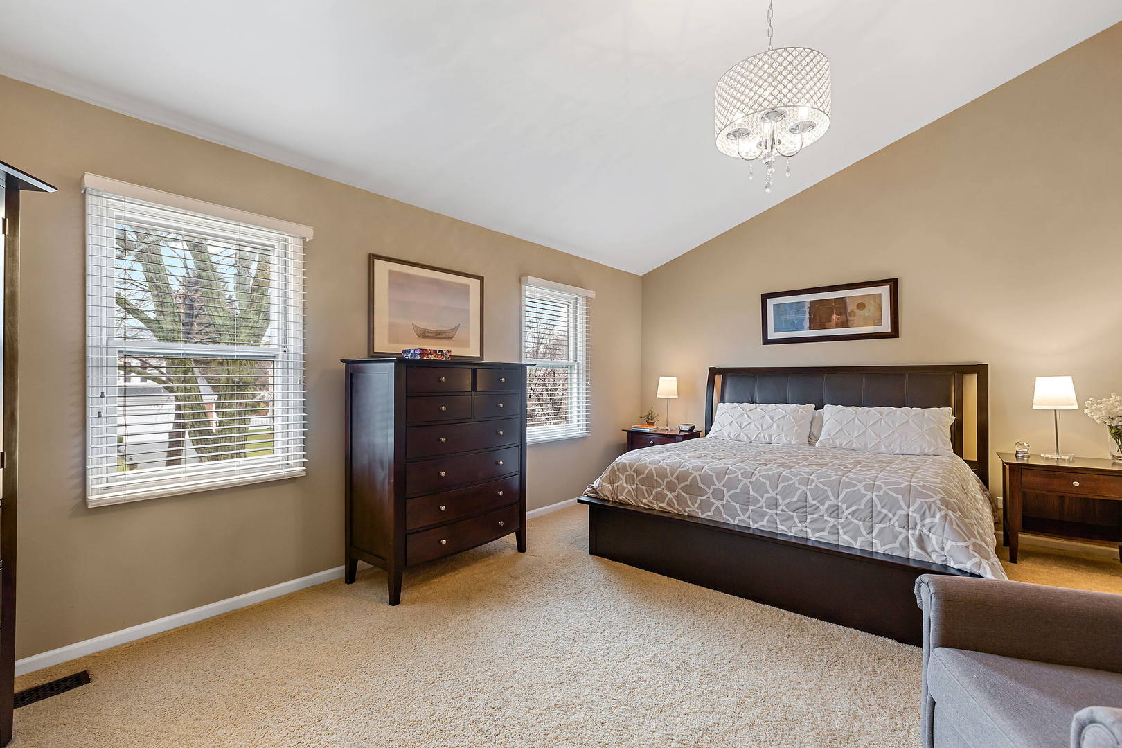 2706 Pebblebrook Lane Rolling Meadows, IL 60008 - Photo 16 of 34 a bedroom with a bed and dresser