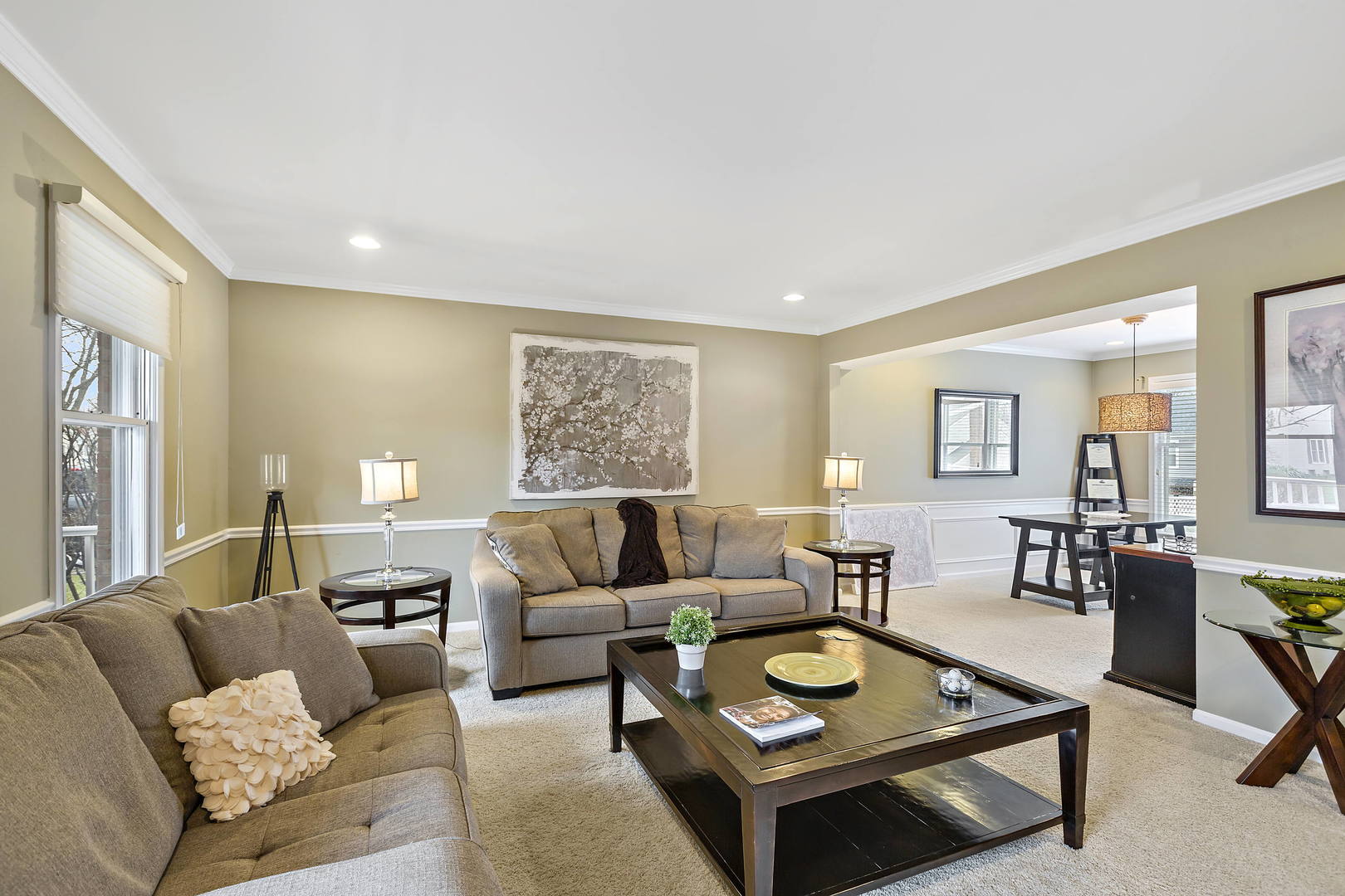 2706 Pebblebrook Lane Rolling Meadows, IL 60008 - Photo 6 of 34 a living room with furniture and a table
