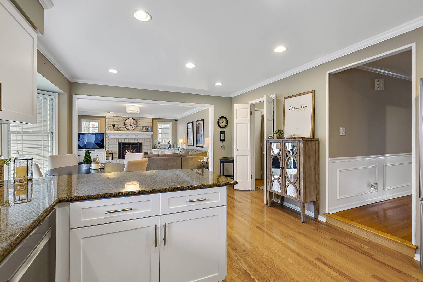 2706 Pebblebrook Lane Rolling Meadows, IL 60008 - Photo 10 of 34 a view of living room with granite countertop cabinets and wooden floor