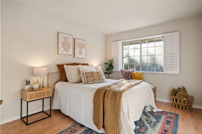 2101 Ornellas Drive Milpitas, CA 95035 - Photo 13 of 17 a bedroom with bed and a window