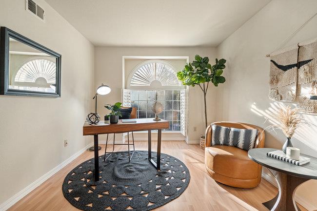 2101 Ornellas Drive Milpitas, CA 95035 - Photo 14 of 17 a living room with furniture and a potted plant