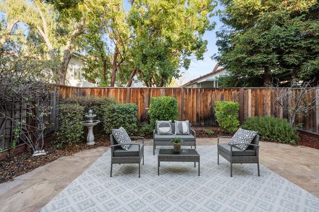 2101 Ornellas Drive Milpitas, CA 95035 - Photo 16 of 17 a backyard of a house with fountain table and chairs
