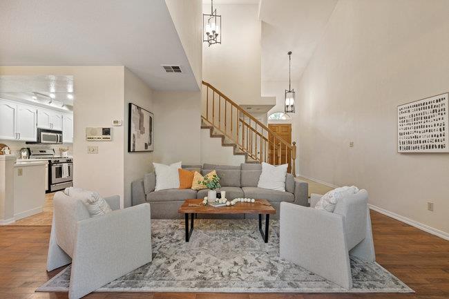 2101 Ornellas Drive Milpitas, CA 95035 - Photo 5 of 17 a living room with fireplace furniture and a rug
