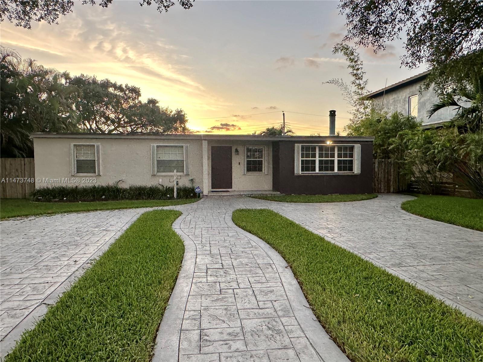 Olympia Heights Miami, FL 33165 - Photo 1 of 45 a front view of a house with yard