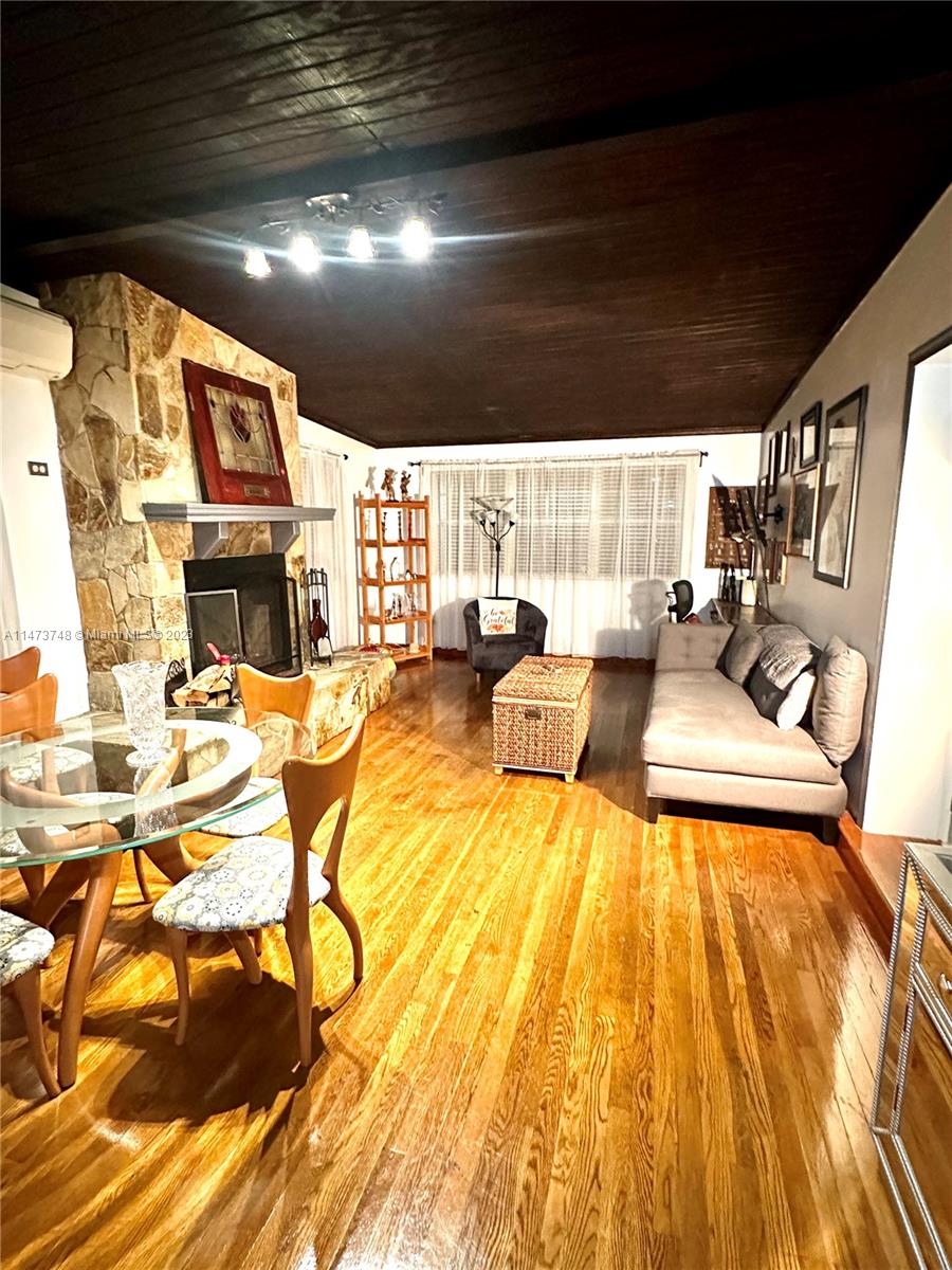 Olympia Heights Miami, FL 33165 - Photo 13 of 45 a swimming pool with outdoor seating