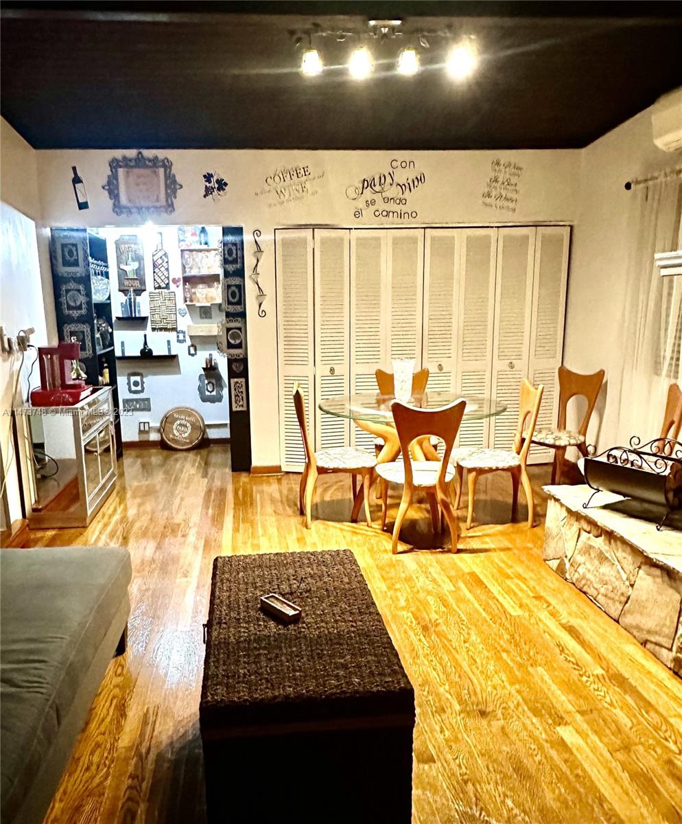 Olympia Heights Miami, FL 33165 - Photo 14 of 45 a living room with furniture and a flat screen tv