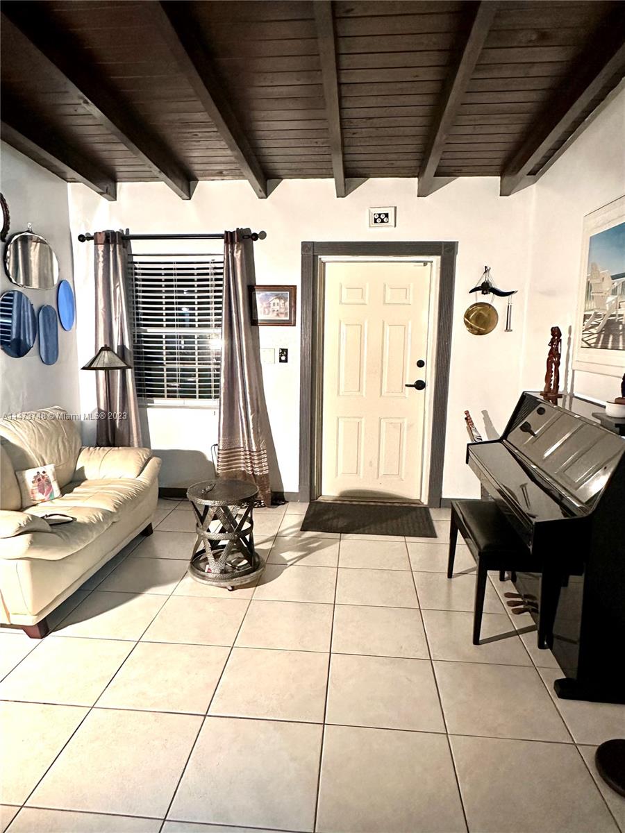 Olympia Heights Miami, FL 33165 - Photo 2 of 45 a lobby with furniture and window